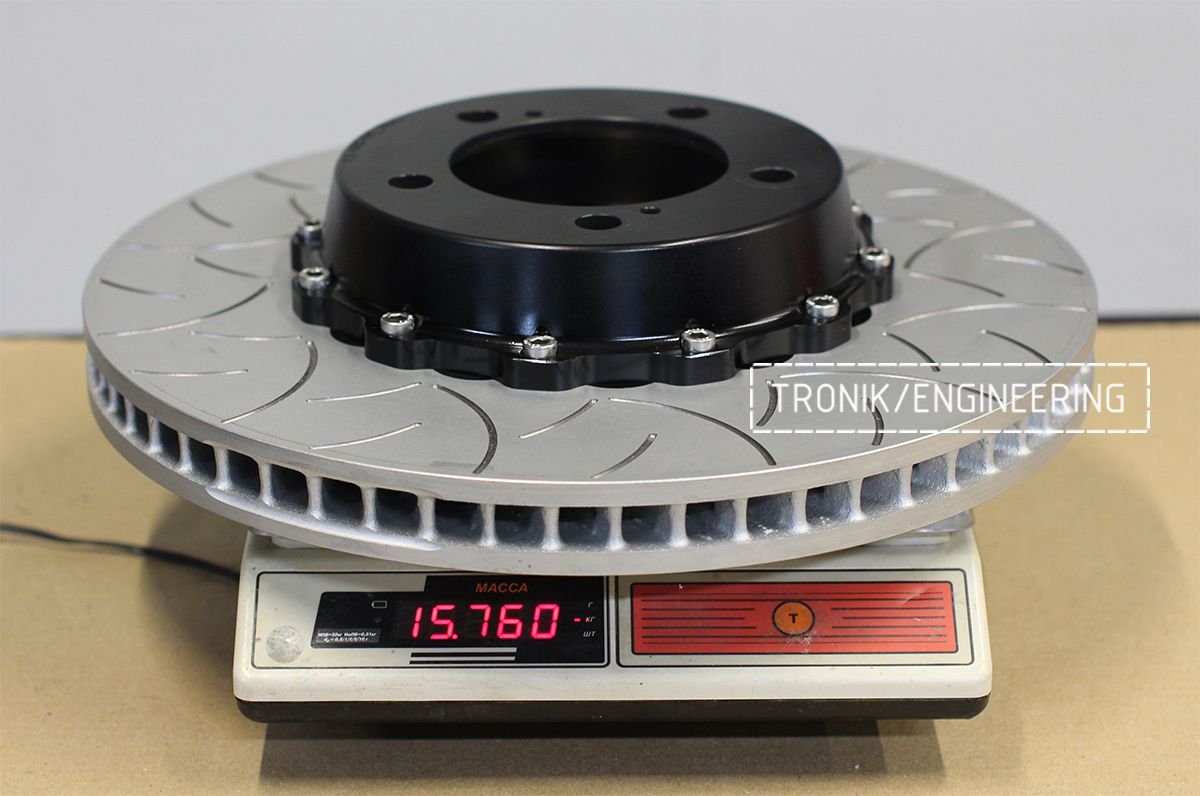 Масса переднего тормозного диска Троник составляет 15,7 кг